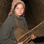 Noemi, a gong farmer, as featured in the Glyphs.
