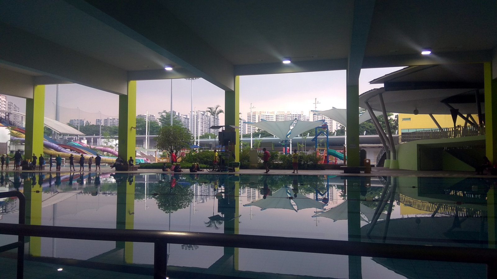 A shot of the pool with everyone waiting for the storm to pass