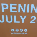 Ottie Pancakes - Orange with white lettering: OPENING IN JULY 2025 Underneath socialmedia icons (Facebook, Instagram, TikTok, Telegram) ottiepancakes.